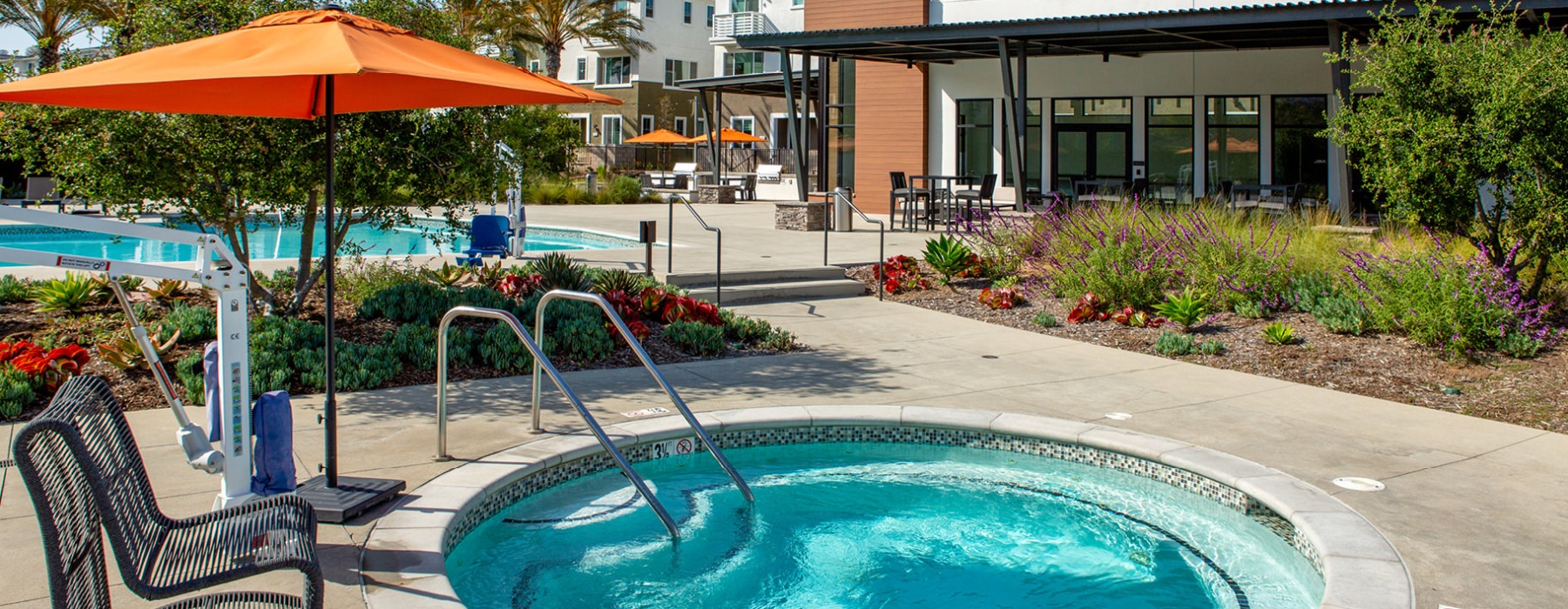 jacuzzi adjacent to pool